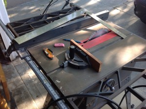 These tools are the best friends of a woodworker and builder. A T Square, Box cutter, Pencil, Eraser, along with a Tablesaw.